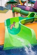 A girl enjoys kidz zone - kiddie amusement and water park in Wild Wild Wet Singapore