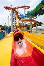 Man plays vortex high speed water slide in wild wild wet water park singapore